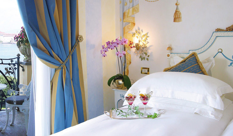 Villa Aminta Lake Maggiore guest room bed access to private terrace elegant décor