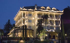 Villa Aminta Lake Maggiore hotel exterior by night ornate architecture