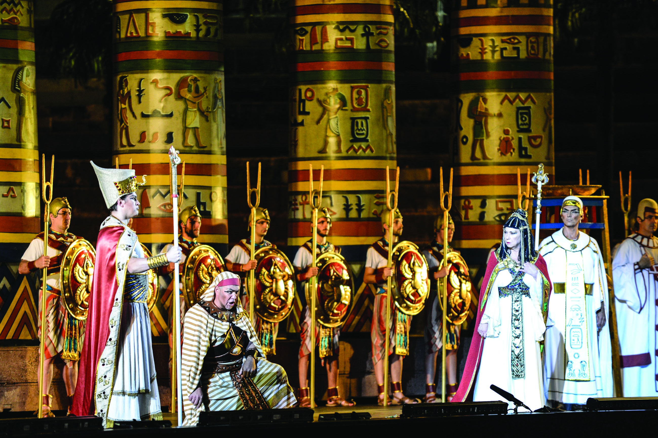 Aida act one men on stage in long white and gold robes
