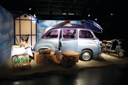 Small blue car in museum