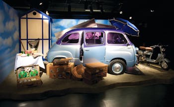 Small blue car in museum