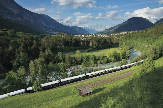 Orient Express train in Austrian mountain landscape