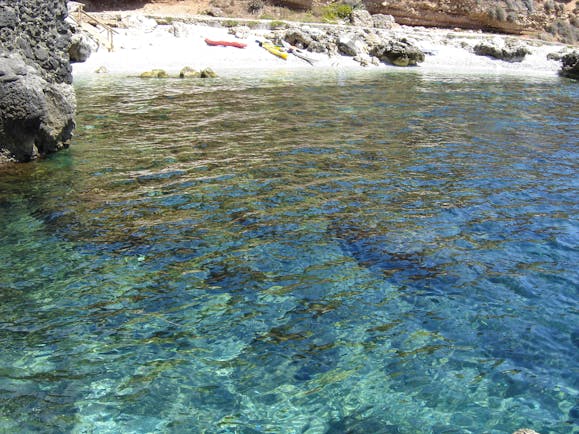 Sandy beach and clear blue water