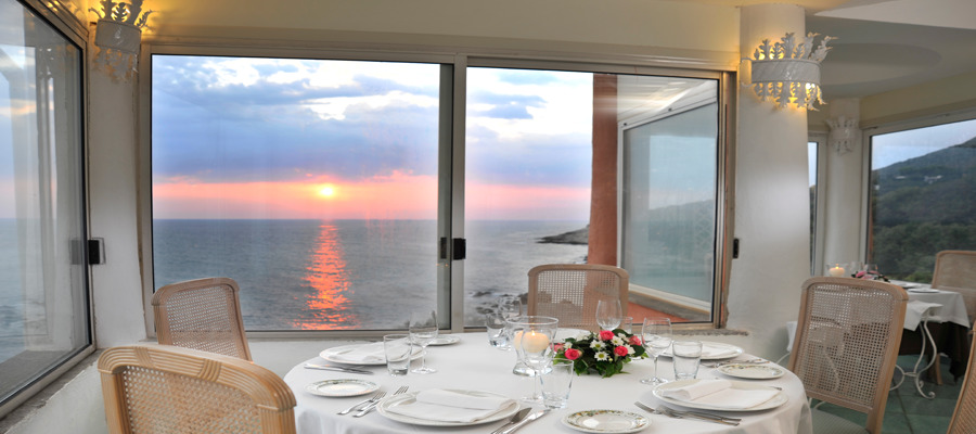 Table by window looking at sunset