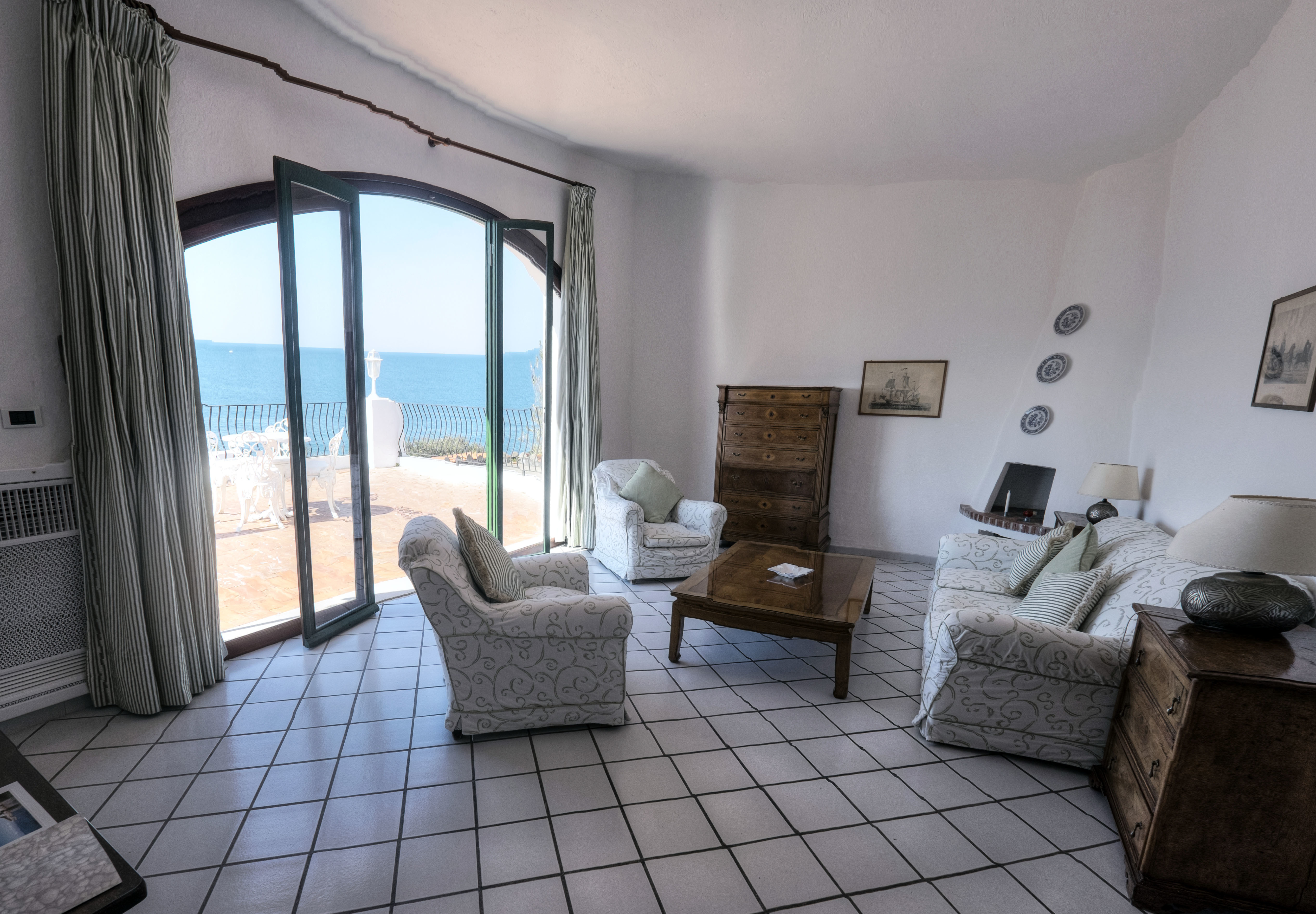 Room with large window and tiled floor