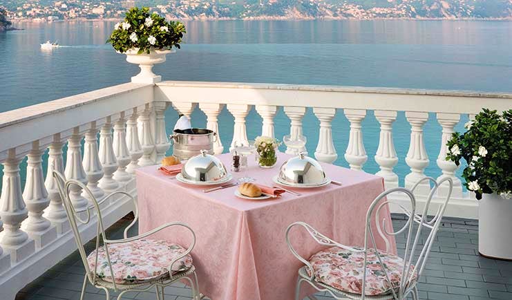 Grand Hotel Miramare Ligurian Riviera suite terrace outdoor dining views over the sea coastline in the distance