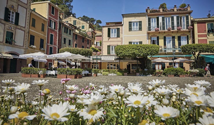 Splendido Portofino exterior hotel on the piazza outdoor seating area daisies in the foreground