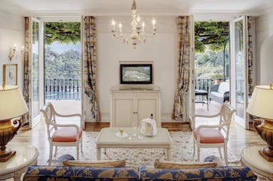 Splendido Portofino suite lounge indoor seating area doors leading to balcony
