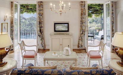 Splendido Portofino suite lounge indoor seating area doors leading to balcony