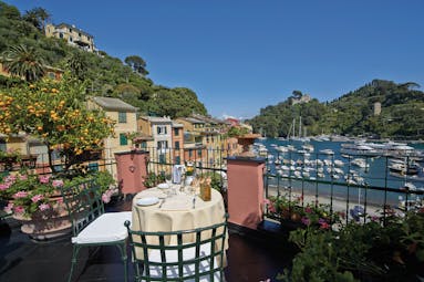 Splendido Portofino Ava Gardner suite terrace outdoor dining overlooking boats in the harbour