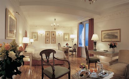 Splendido Portofino suite bed lounge area elegant décor