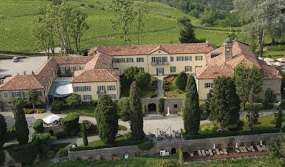 Relais San Maurizio Piemonte aerial shot of hotel buildings gardens pool