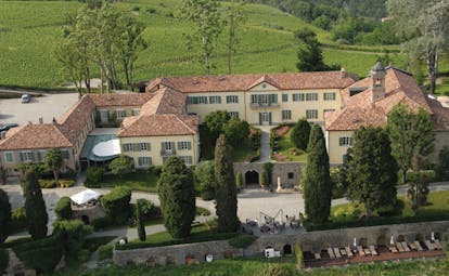 Relais San Maurizio Piemonte aerial shot of hotel buildings gardens pool