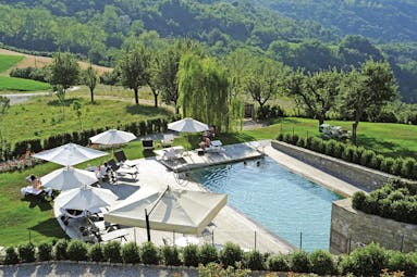 Relais Villa D' Amelia Piemonte pool sun loungers view of countryside
