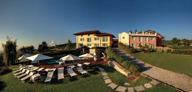 Relais Villa D' Amelia Piemonte pool side sun loungers hotel building rear