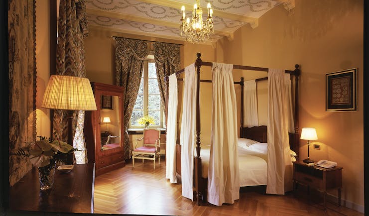 Relais Villa Matilde Piemonte suite four poster canopy bed traditional décor