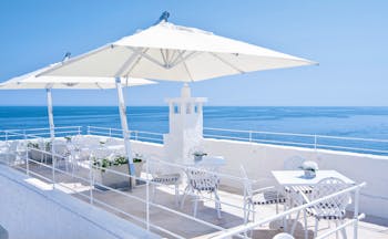 Don Ferrante Puglia rooftop restaurant overlooking the sea
