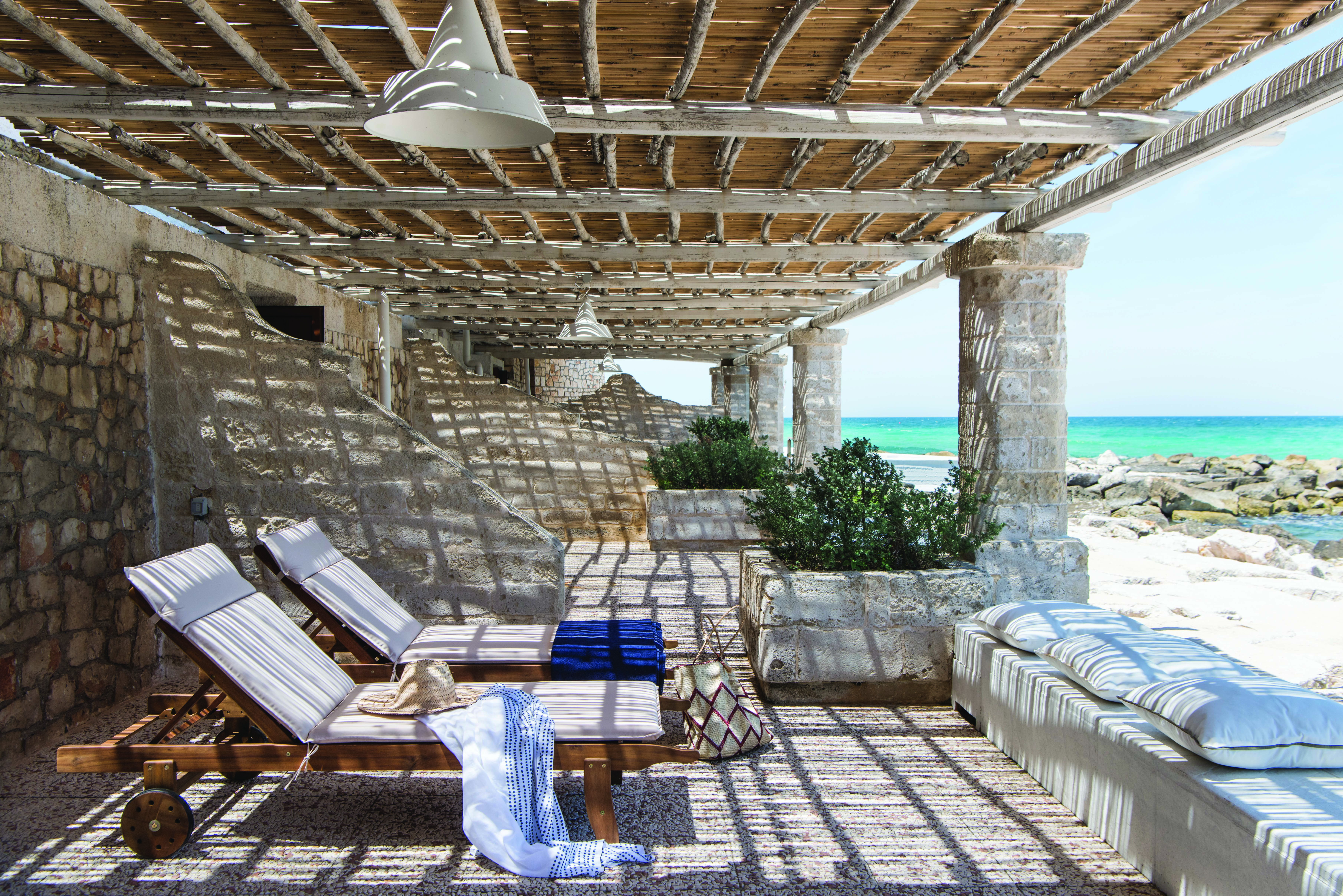 La Peschiera Puglia patio on the beach shaded area with sun loungers