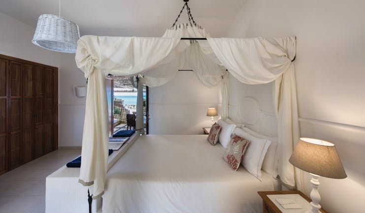 La Peschiera Puglia sunrise room canopied bed doors out to private terrace