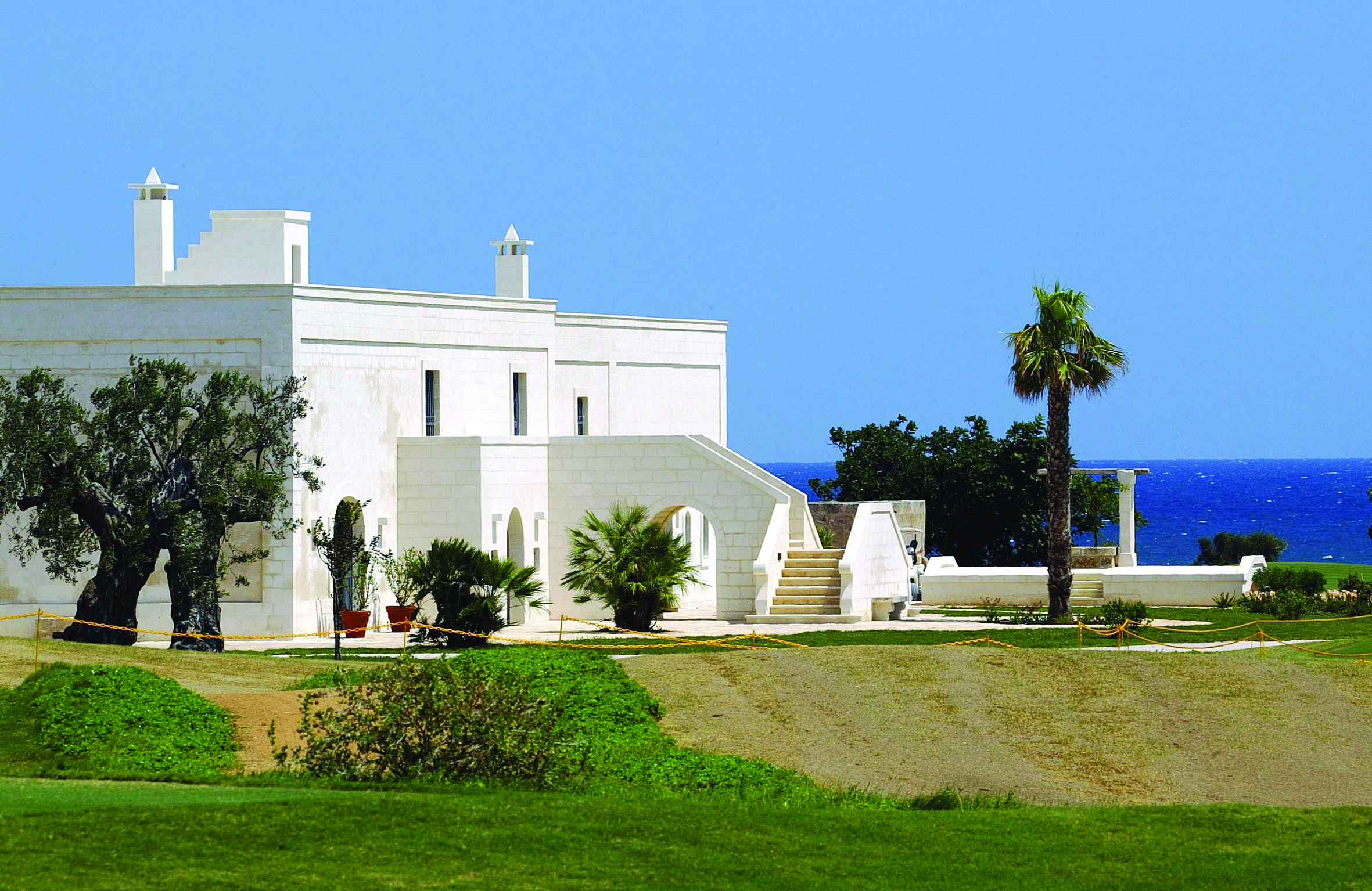 Masseria San Domenico Puglia exterior hotel building lawns sea in background