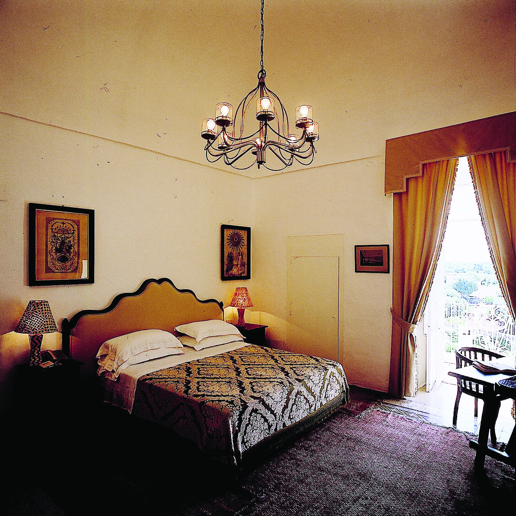 Masseria Torre Coccaro Puglia deluxe junior suite bed balcony traditional décor