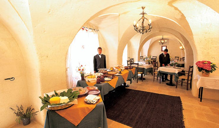 Masseria Torre Coccaro Puglia restaurant buffet waiter traditional décor