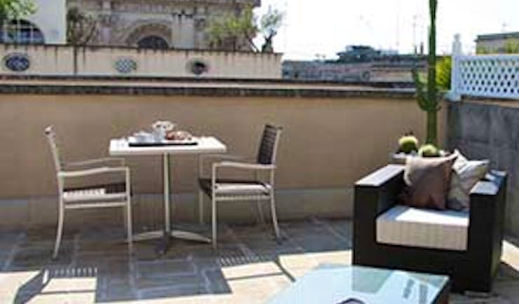 Patria Palace Puglia private terrace outdoor seating and dining area