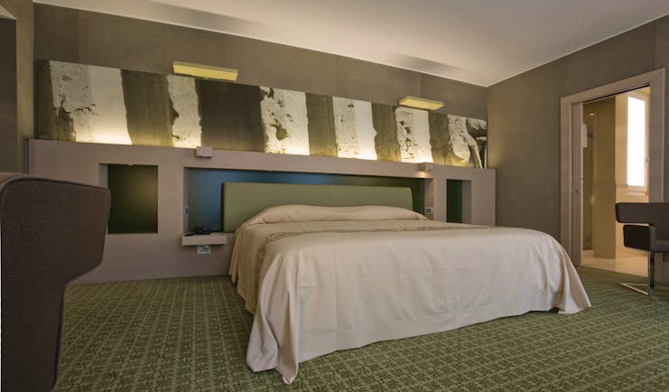 Risorgimento Resort Puglia executive bedroom bed en suite bathroom modern décor