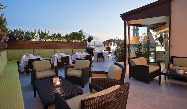 Risorgimento Resort Puglia outdoor dining rooftop restaurant at dusk