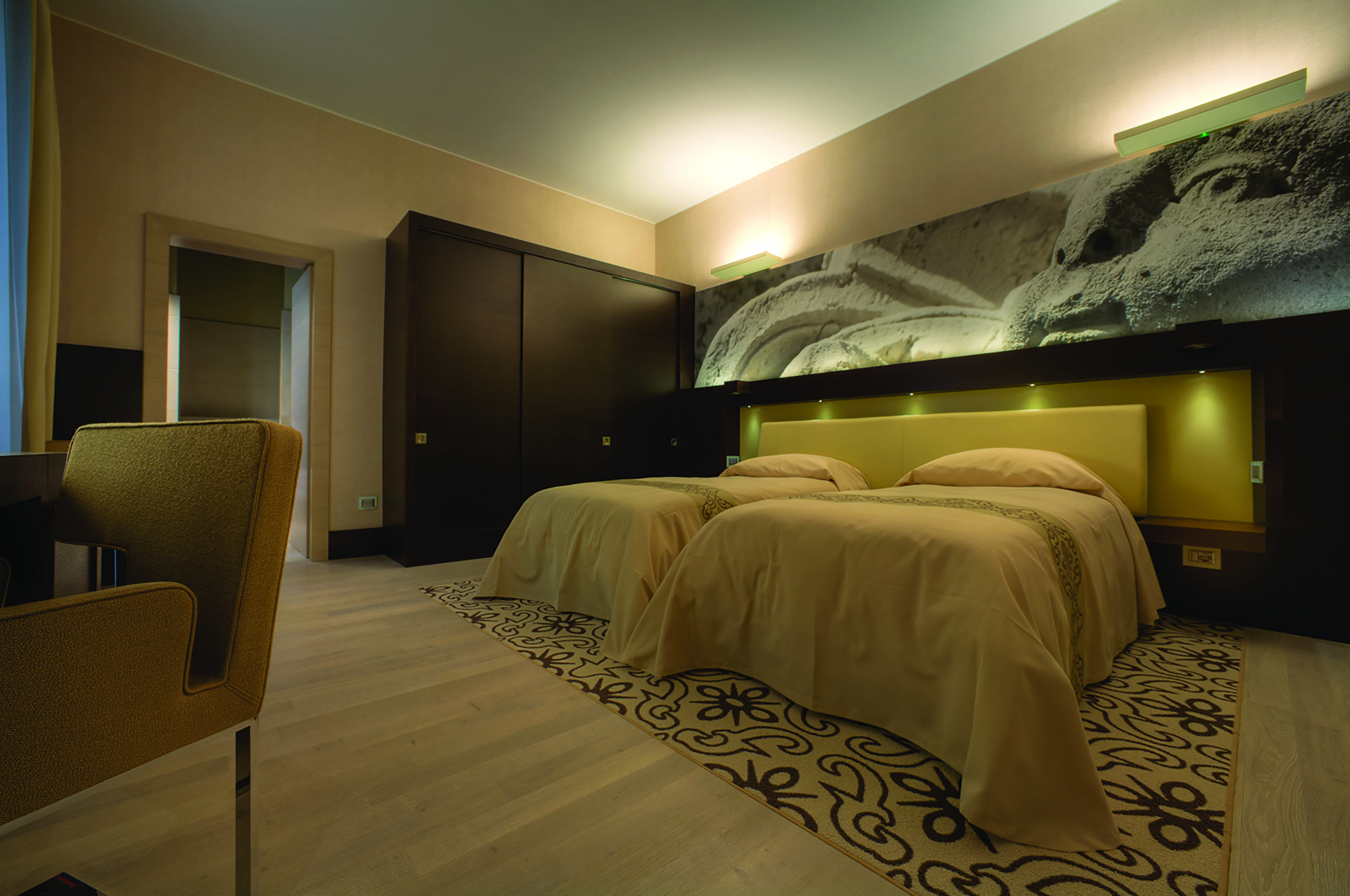 Risorgimento Resort Puglia superior room  twin beds en suite bathroom modern décor