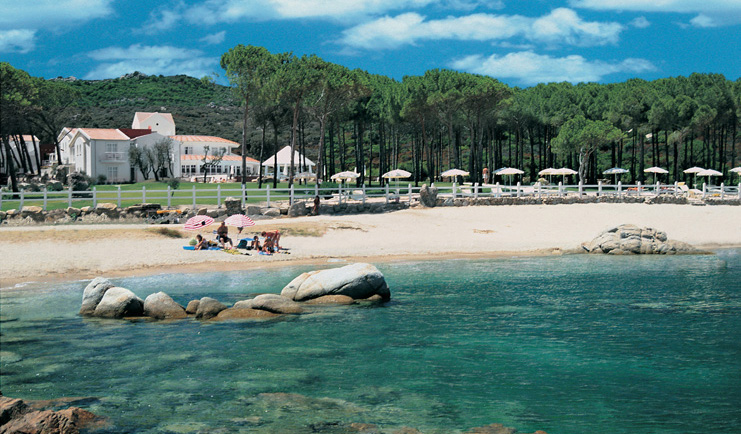 Hotel La Coluccia Sardinia beach sandy beach sea hotel buildings in background