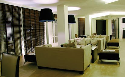 Hotel La Coluccia Sardinia lounge indoor communal seating area sofas modern décor