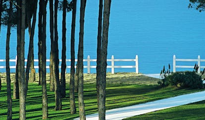 Hotel La Coluccia Sardinia sea shot of sea from gardens trees lawns