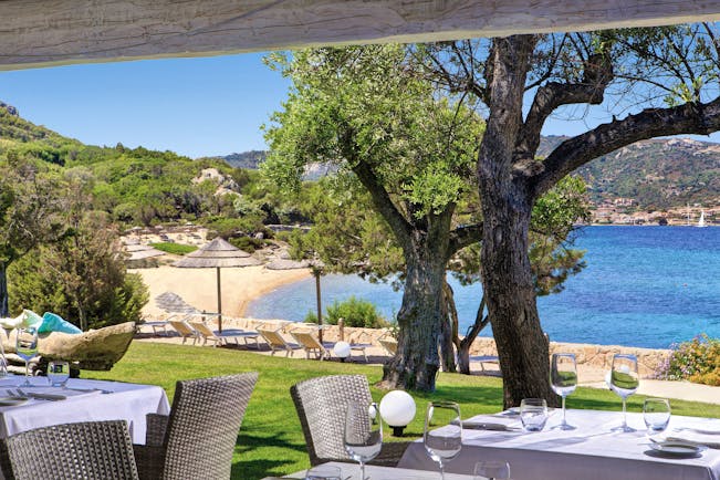 La Rocca Sardinia beach dining sun loungers umbrella 