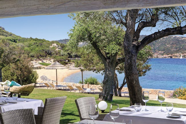 La Rocca Sardinia beach dining sun loungers umbrella 