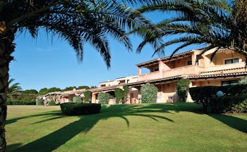 La Rocca Sardinia hotel exterior building lawns trees