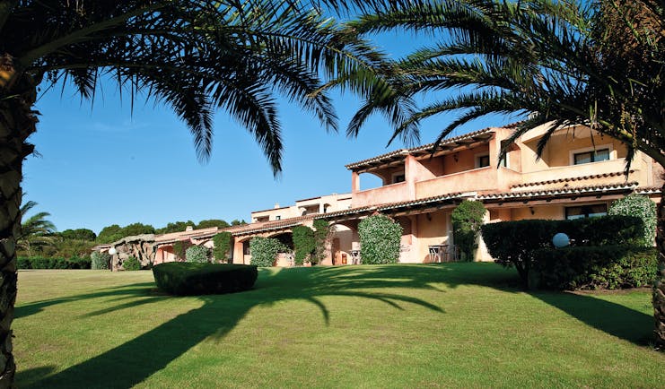 La Rocca Sardinia hotel exterior building lawns trees