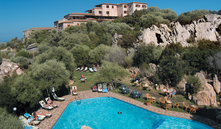 Hotel Rocce Sarde Sardinia pool sun loungers gardens hotel building in background