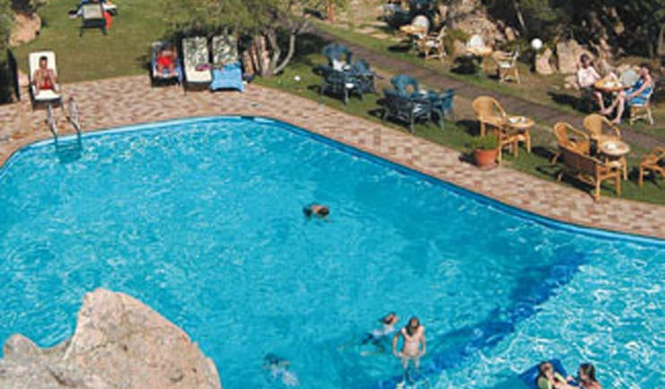 Hotel Rocce Sarde Sardinia poolside sun loungers lawns 