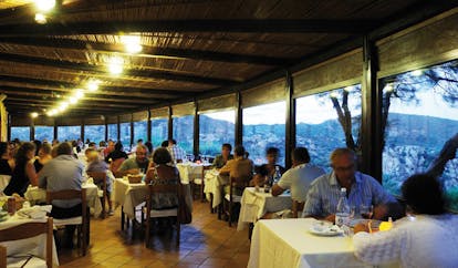Hotel Rocce Sarde Sardinia restaurant indoor dining area modern décor
