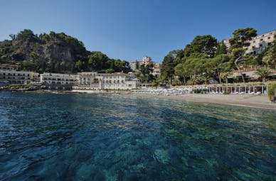 Villa Sant Andrea Sicily beach umbrellas sun loungers