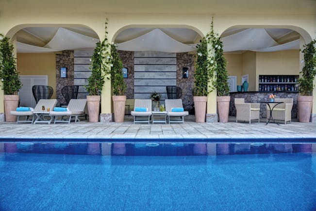 Villa Sant Andrea Sicily pool sun loungers on decking