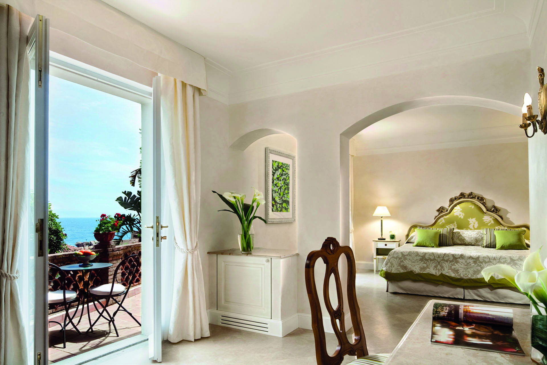 Villa Sant Andrea Sicily bedroom living area terrace with outdoor seating modern décor