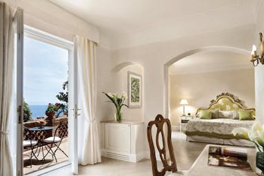 Villa Sant Andrea Sicily bedroom living area terrace with outdoor seating modern décor