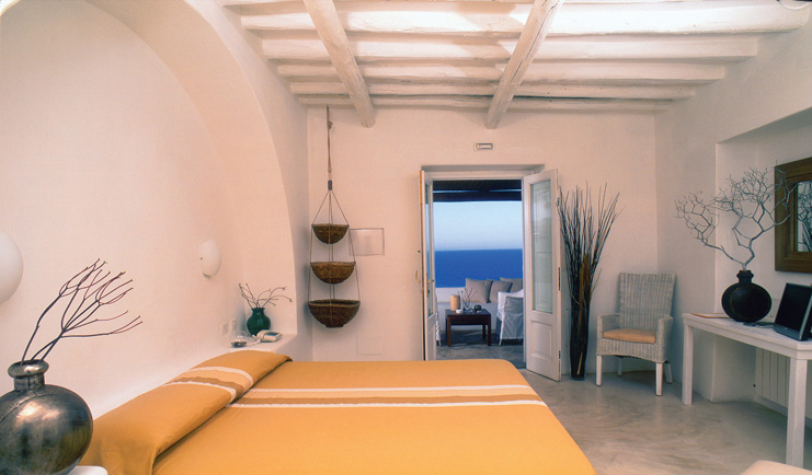 Capofaro Hotel Sicily standard room bed modern décor private terrace