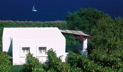 Capofaro Hotel Sicily suite 21 exterior flat roofed building vineyard surrounds sea views
