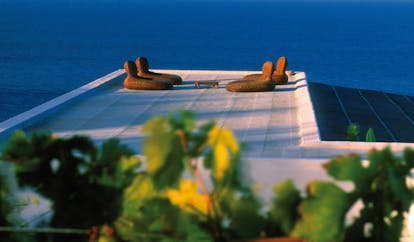 Capofaro Hotel Sicily terrace on flat rooftop overlooking sea