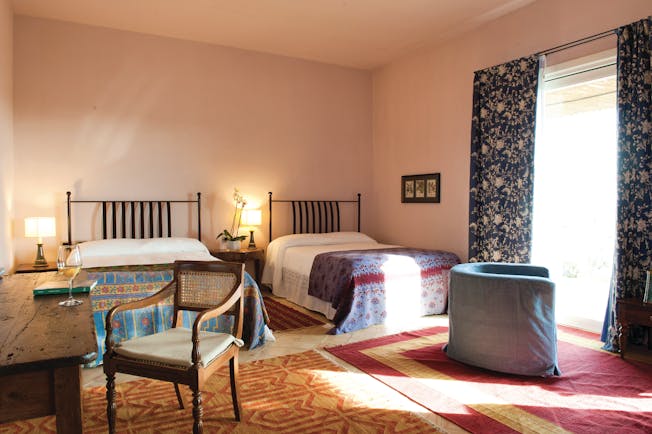 Foresteria La Planeta Sicily bedroom two double beds rustic décor