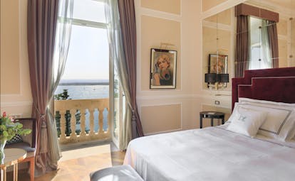 Grand hotel on waterfront in historic town of Ortigia
