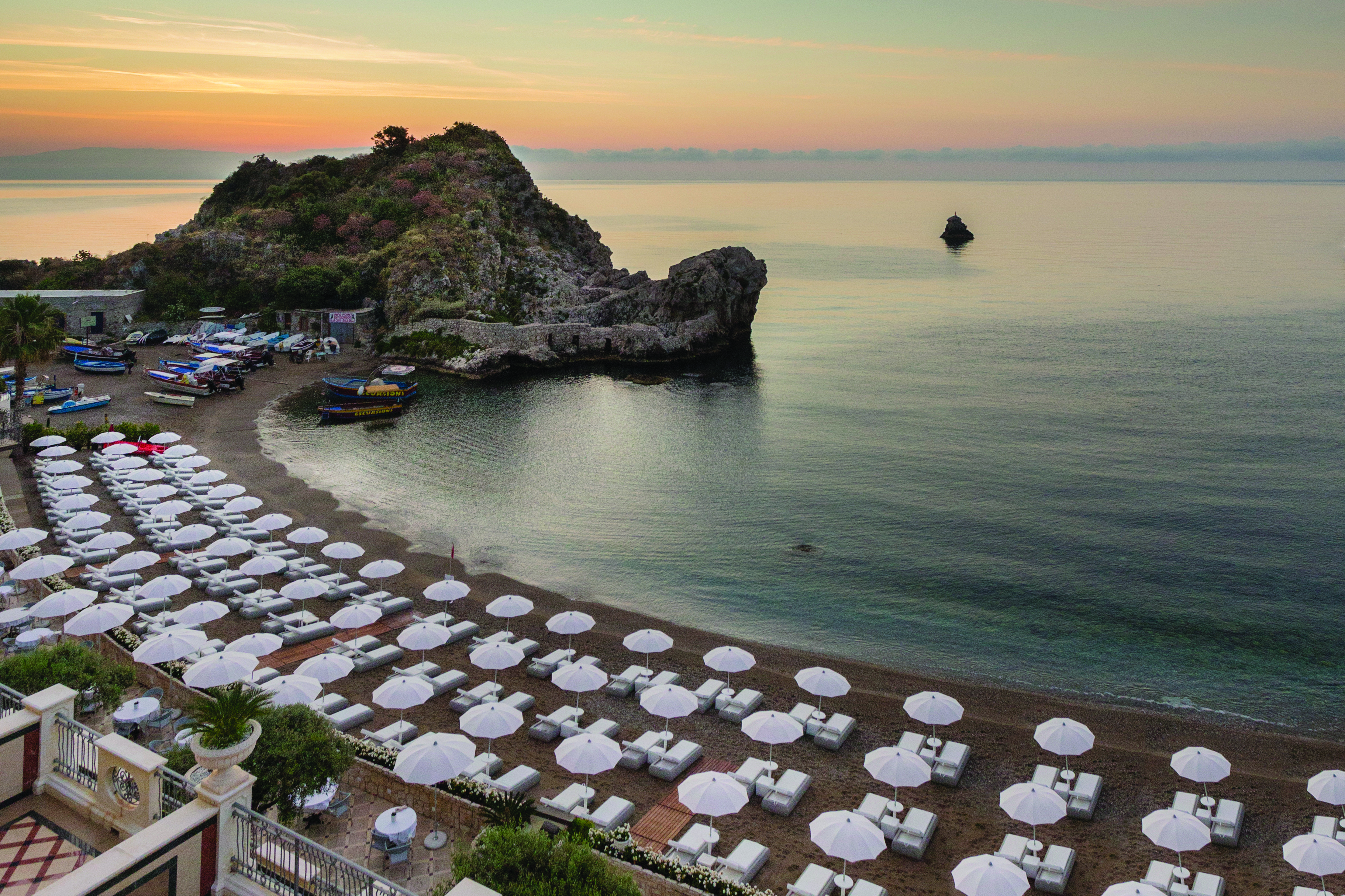 Mazzaro Sea Palace Sicily beach umbrellas sun loungers